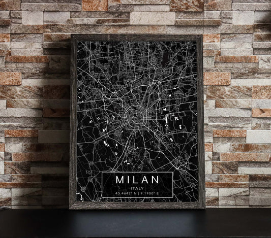 Black and white map print of Milan, Italy. The dark background highlights the city's street layout and landmarks, with coordinates listed beneath the city name