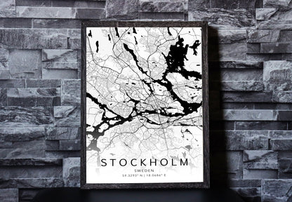 Black and white map print of Stockholm, Sweden. The map displays intricate city streets and geographical details, with coordinates listed beneath the city name