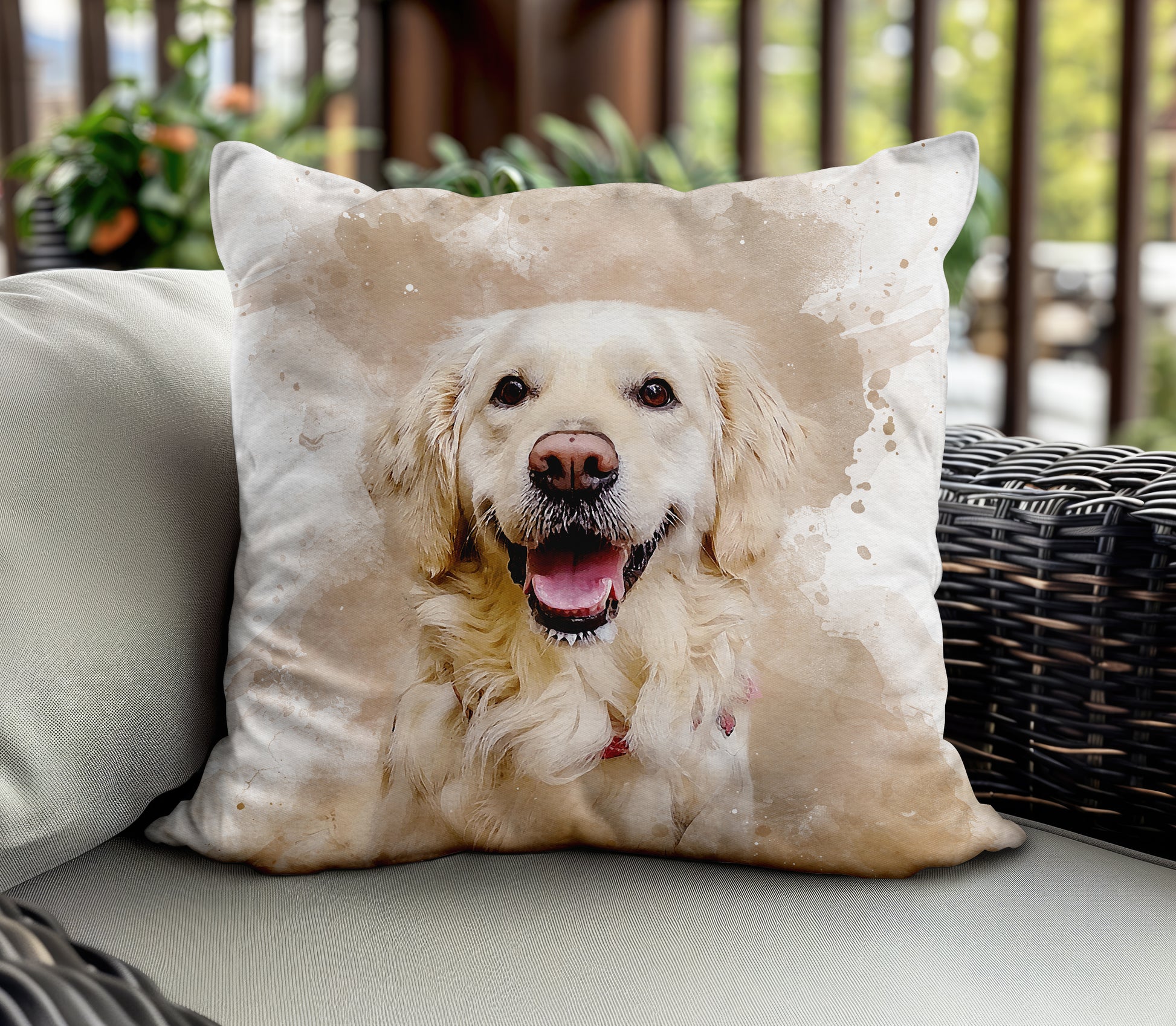 A decorative pillow on a wicker chair, featuring a watercolor-style portrait of a happy golden retriever. The retriever has a big smile, with its tongue slightly out and a soft golden coat, giving the pillow a warm, cheerful vibe.